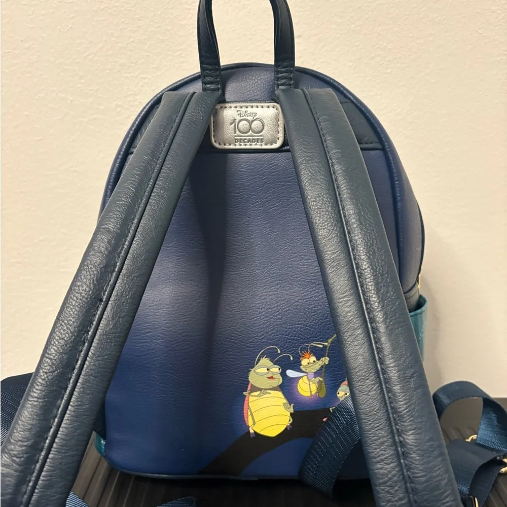 Loungefly Blue and Teal King Louie Glow In The Dark Mini Backpack